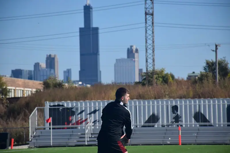 Loyola player and Chicago skyline