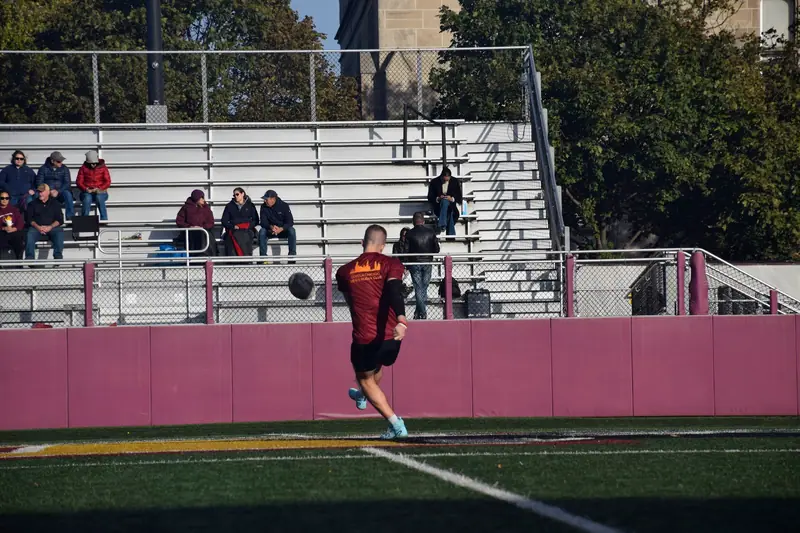 Loyola player walking touchline